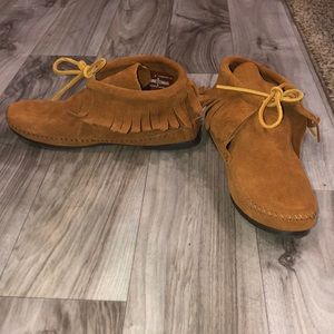 Laced Minnetonka moccasins